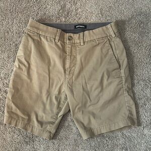 Express above the knee shorts, size 28 and color tan.
